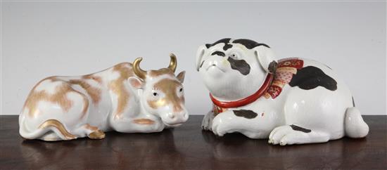 A Japanese Kutani model of a puppy and a similar model of a cow, late 19th century, 20.5 and 21.5cm, cow restored